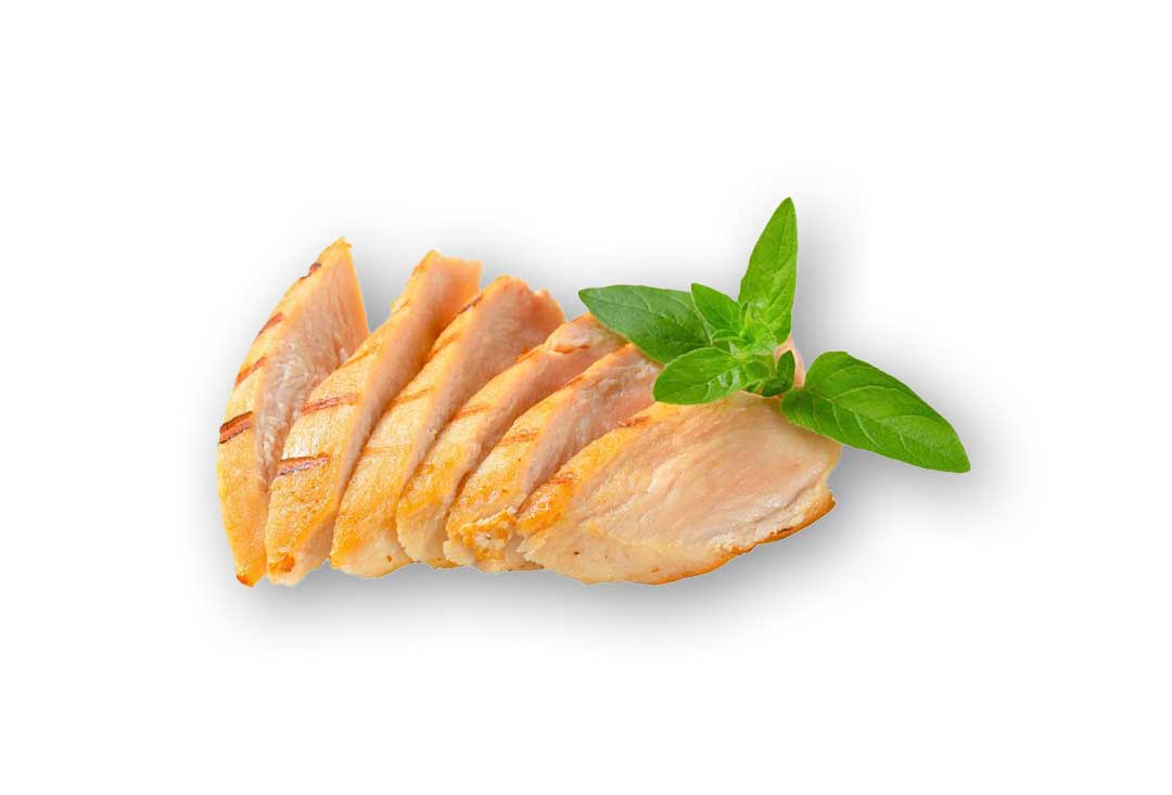 A series of uniformly sliced, cooked chicken breast pieces, displaying grill marks and a slight pink hue in the center.