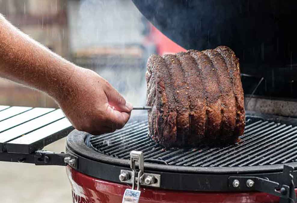 Using RFX thermometer probe as aa leave-in thermometer to monitor check the internal temperature of a beef joint on a BBQ smoker.