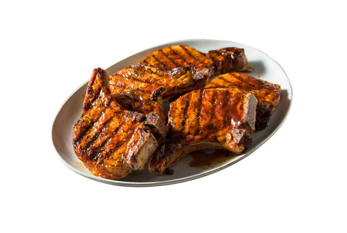 pork chops bbqbbq pork chops on a plate
