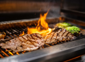 Kenny Tutt's Hanger Steak with Salsa Verde & Charred Spring Onions